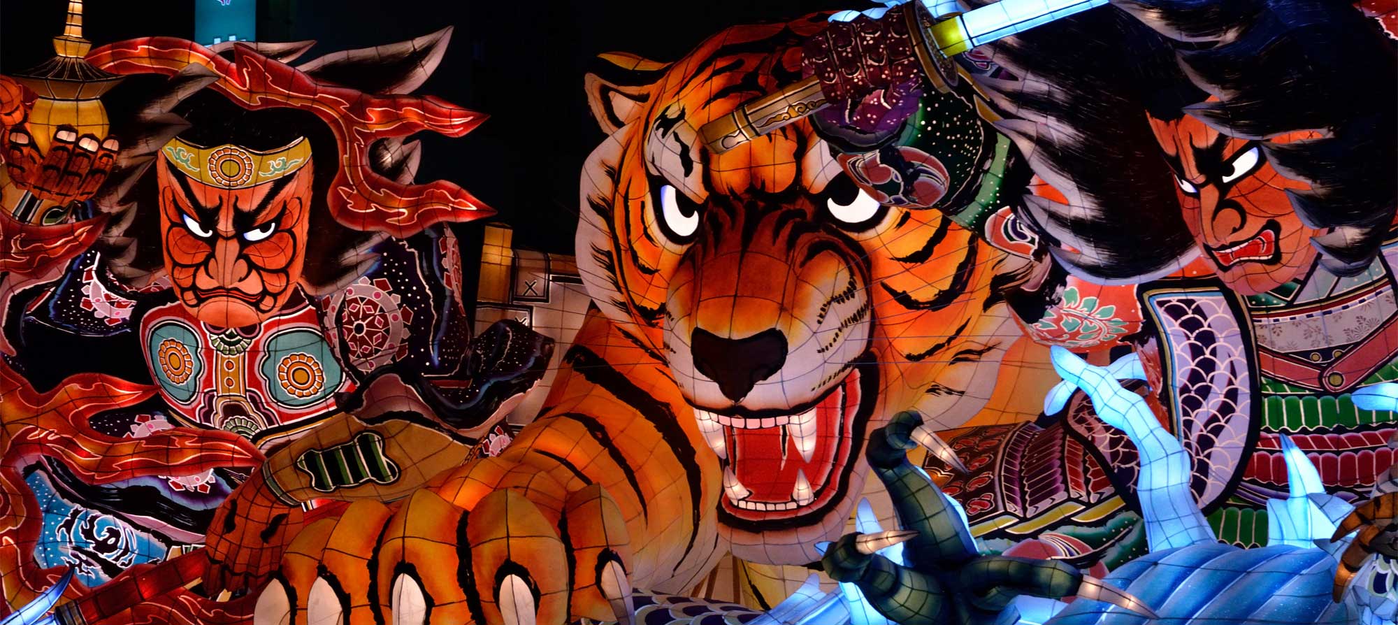 Large lantern floats Nebuta, which are constructed of painted washi paper over a wire frame. Aomori Prefecture